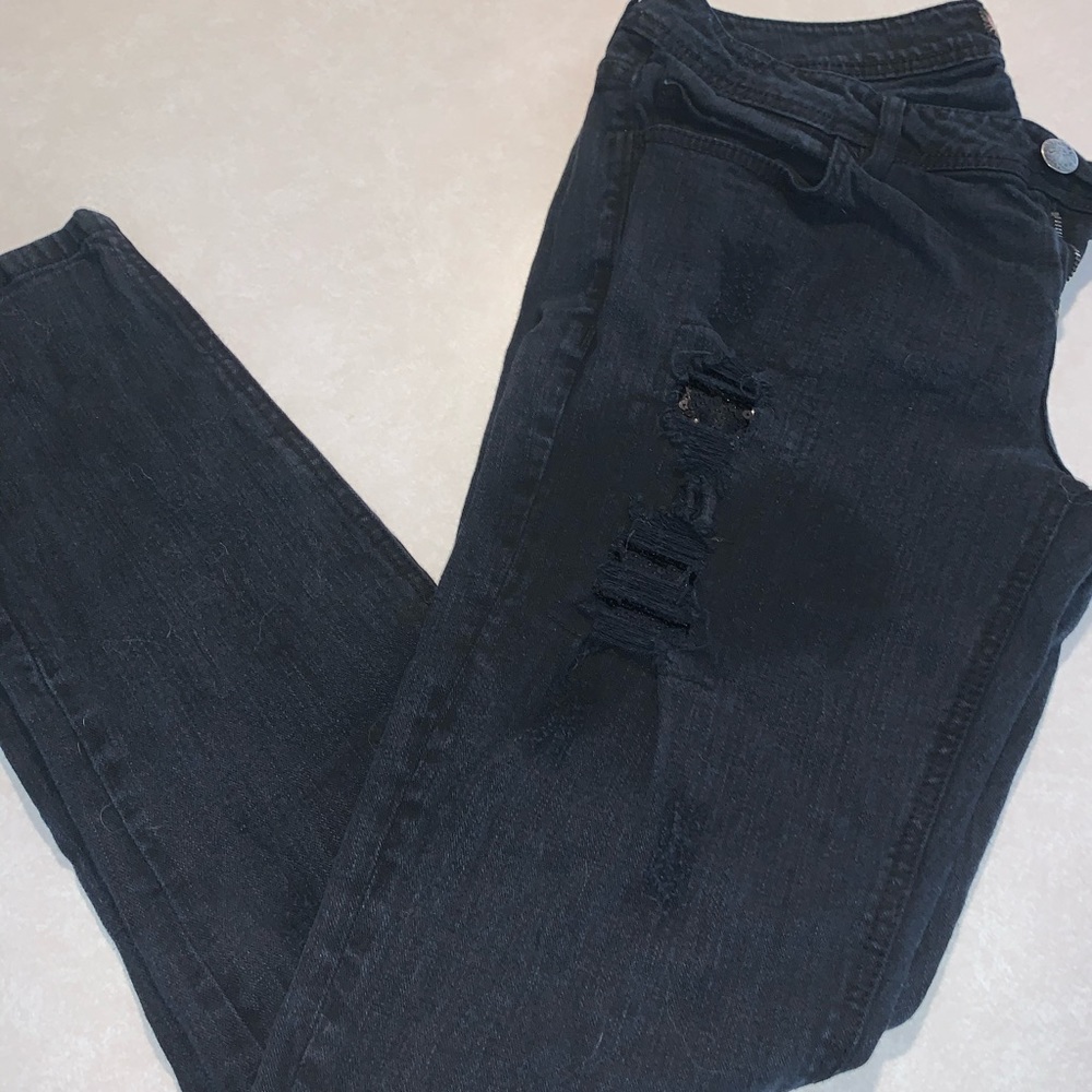Black full length jeans with sequin covered holes